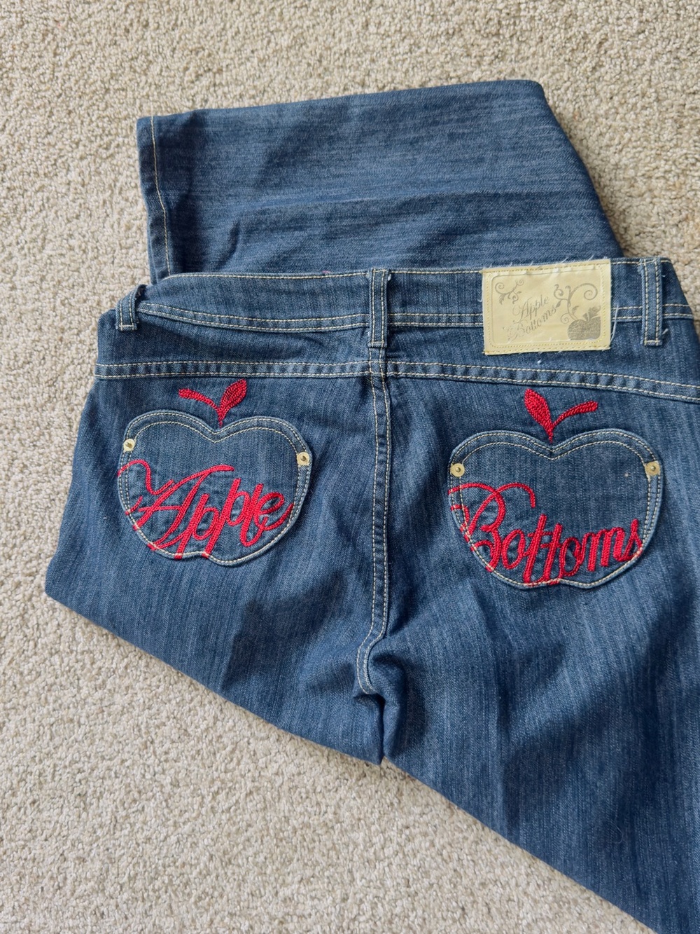 Apple Bottoms Dark Blue Bootcut Jeans with Red Embroidered Apple Pockets